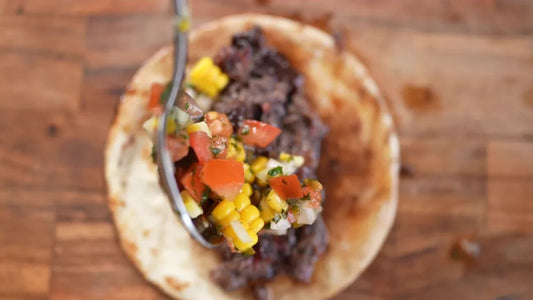 Ready to serve. Beef cheek taco prepared by Adriano with Mexicana seasoning - Secondary view