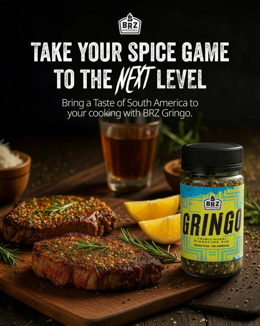 BRZ Food Gringo Chimichurri Signature Rub served with grilled steaks, fresh herbs and citrus wedges on a wooden serving board. - Secondary view