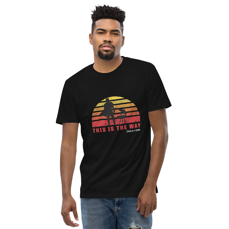Man wearing the tee, the sunset print centred on his chest