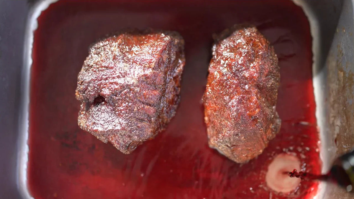 The cook. Beef cheeks cooking in Adriano's Mexicana taco recipe