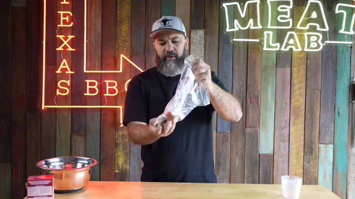 The seasoning. Adriano mixing Thunderbird and rice flour in a bag for his chicken wings